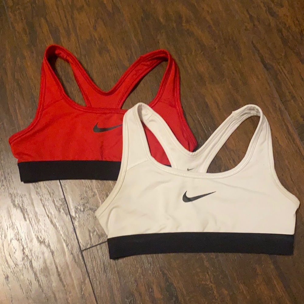 Red and white Nike sports bras. Size Youth small